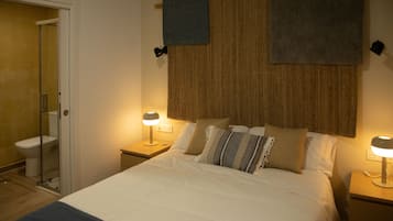 Ropa de cama de alta calidad, cubrecamas y minibar
