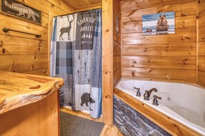 Bathtub, hair dryer, towels