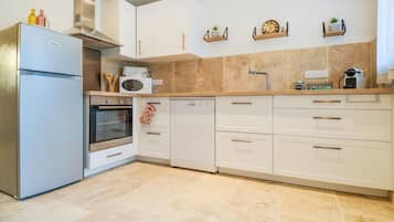 Réfrigérateur, four, plaque de cuisson, lave-vaisselle