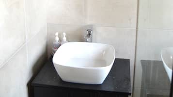 Shower, towels, soap, shampoo