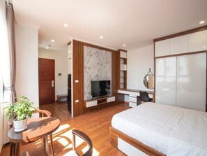 Superior Apartment, City View | Living area | 50-inch flat-screen TV with digital channels, fireplace - Sumitomo 11 APT - Alley 39 Linh lang (Hanoi)