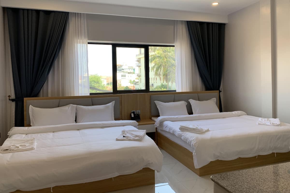 Habitación cuádruple familiar, 2 camas Queen size | Wifi gratis y ropa de cama