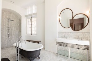 Shower, hair dryer, towels, soap