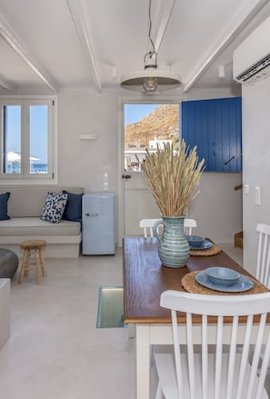 Beachfront Boutique Houses (Blue) | Living area | LCD TV - KLIMA BAY Beachfront Boutique Houses (Milos)