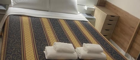 Hypo-allergenic bedding, individually furnished, laptop workspace