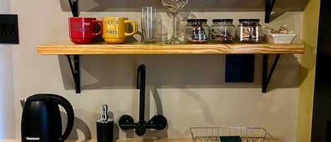 Fridge, microwave, electric kettle, cookware/dishes/utensils