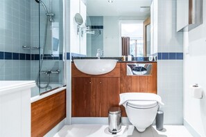 Shower, towels, soap, toilet paper