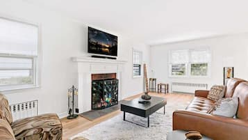 TV, fireplace, books, offices