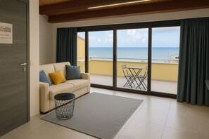 Standard Apartment, Sea View | Living area