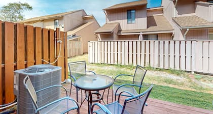 Dog-friendly townhome steps from the sand with private patio, central AC, & W/D
