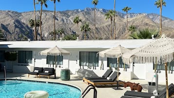 Outdoor pool, open 8:00 AM to 9:00 PM, pool umbrellas, pool loungers