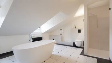 Bathtub, hair dryer, towels