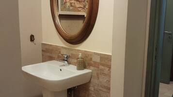 Apartment, 1 Bedroom, Smoking | Bathroom | Bathrobes, toilet paper