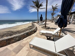 Sillas reclinables de playa, toallas de playa