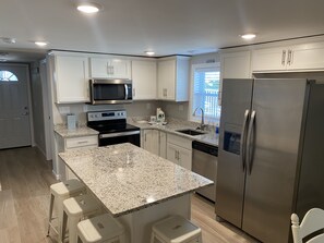 Fridge, microwave, oven, stovetop - On Deck Lower: 3BR/2BA Unit in Surfside Beach, Walk to Beach & Pet Friendly! (Surfside Beach)