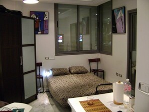 开间, 1 间卧室, 吸烟房, 阳台 | 起居区