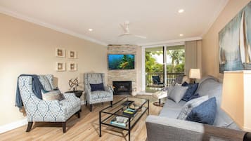 Condo, 1 King Bed with Sofa bed, Pool Access, Garden View (B114 ) | Living area | Fireplace