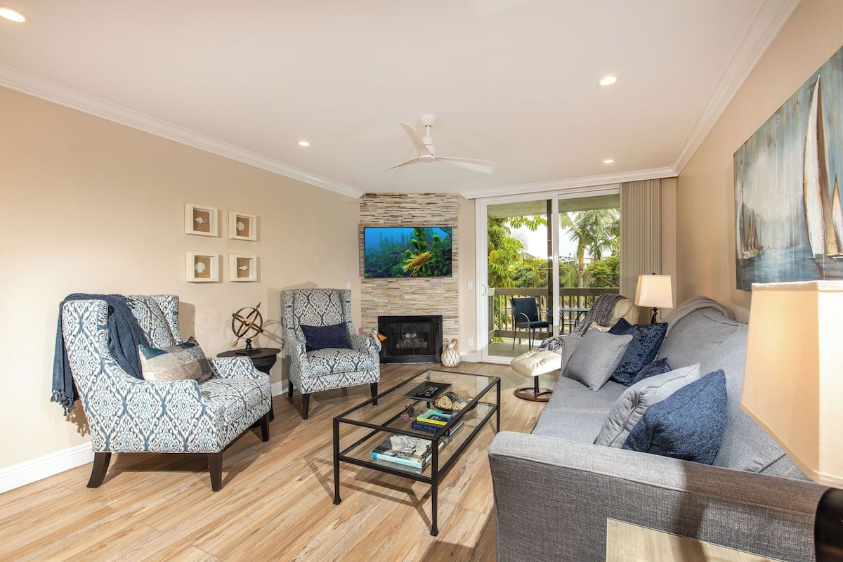 Condo, 1 King Bed with Sofa bed, Pool Access, Garden View (B114 ) | Living area | Fireplace