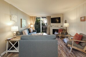 Condo, 1 King Bed with Sofa bed, Pool Access, Pool View (B119 Vitamin Sea) | Living area | Fireplace - Oceanside Beach Condos (Oceanside)