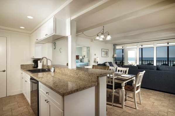 Condo, Multiple Beds, Patio, Ocean View (1025C) | Private kitchen | Coffee/tea maker, dining tables - Beachfront Retreat (Oceanside)