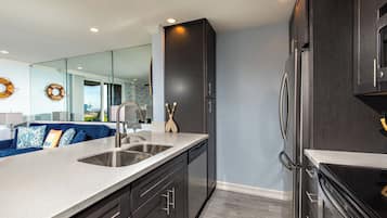 Condo, 1 King Bed with Sofa bed, Pool Access, Beach View (E7 ) | Private kitchen | Coffee/tea maker