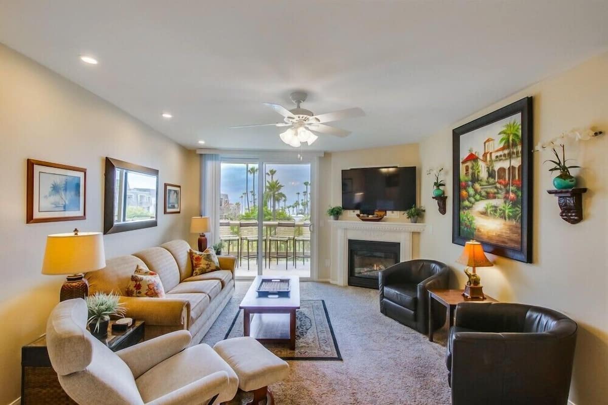 Condo, Multiple Beds, Pool Access, Garden View (B315) | Living area | TV, fireplace