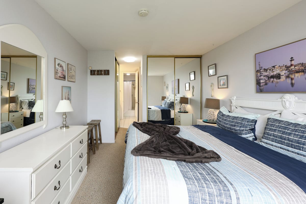 Condo, 1 King Bed with Sofa bed, Pool Access, Garden View (B226) | 1 bedroom, individually decorated, individually furnished, bed sheets