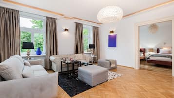 Deluxe Apartment | Living room | 45-inch Smart TV with digital channels