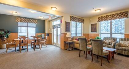 Ski right from your door in this bright, ground level condo at Creekside