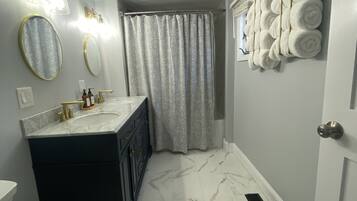 Hair dryer, towels, soap, shampoo