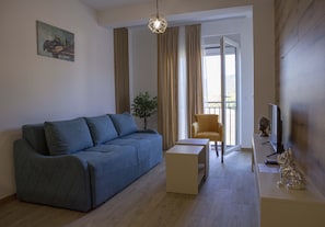 Exclusive-Apartment | Wohnbereich | 32-Zoll-Flachbildfernseher mit Kabelempfang