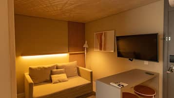 Standard Suite | Living area | 42-inch Smart TV with digital channels