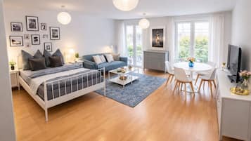 3 slaapkamers, een bureau, een strijkplank/strijkijzer, reisbedje