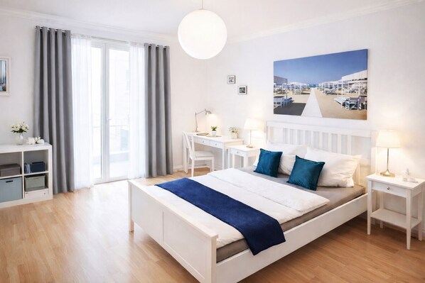 A modern hotel room with a bed, desk, and chair, a large window with curtains, and a painting on the wall. - 𝓑est Central 170sqm 𝓛uxury Apartment Museums Island (Berlin)