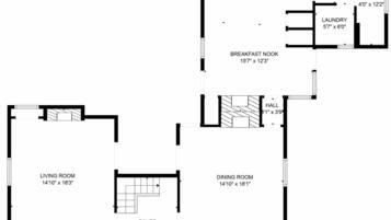 A floor plan with a living room, dining room, foyer, kitchen, breakfast nook, two hallways, and a bathroom.