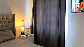 2 dormitorios, tabla de planchar con plancha, wifi gratis y ropa de cama