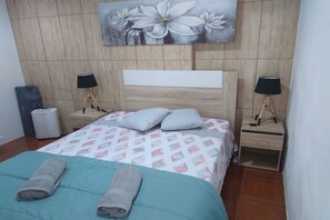 1 dormitorio, tabla de planchar con plancha, wifi gratis y ropa de cama