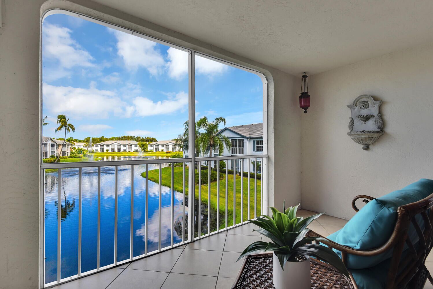 Laurel Oaks at Pelican Bay 2 bedroom lake front condo!