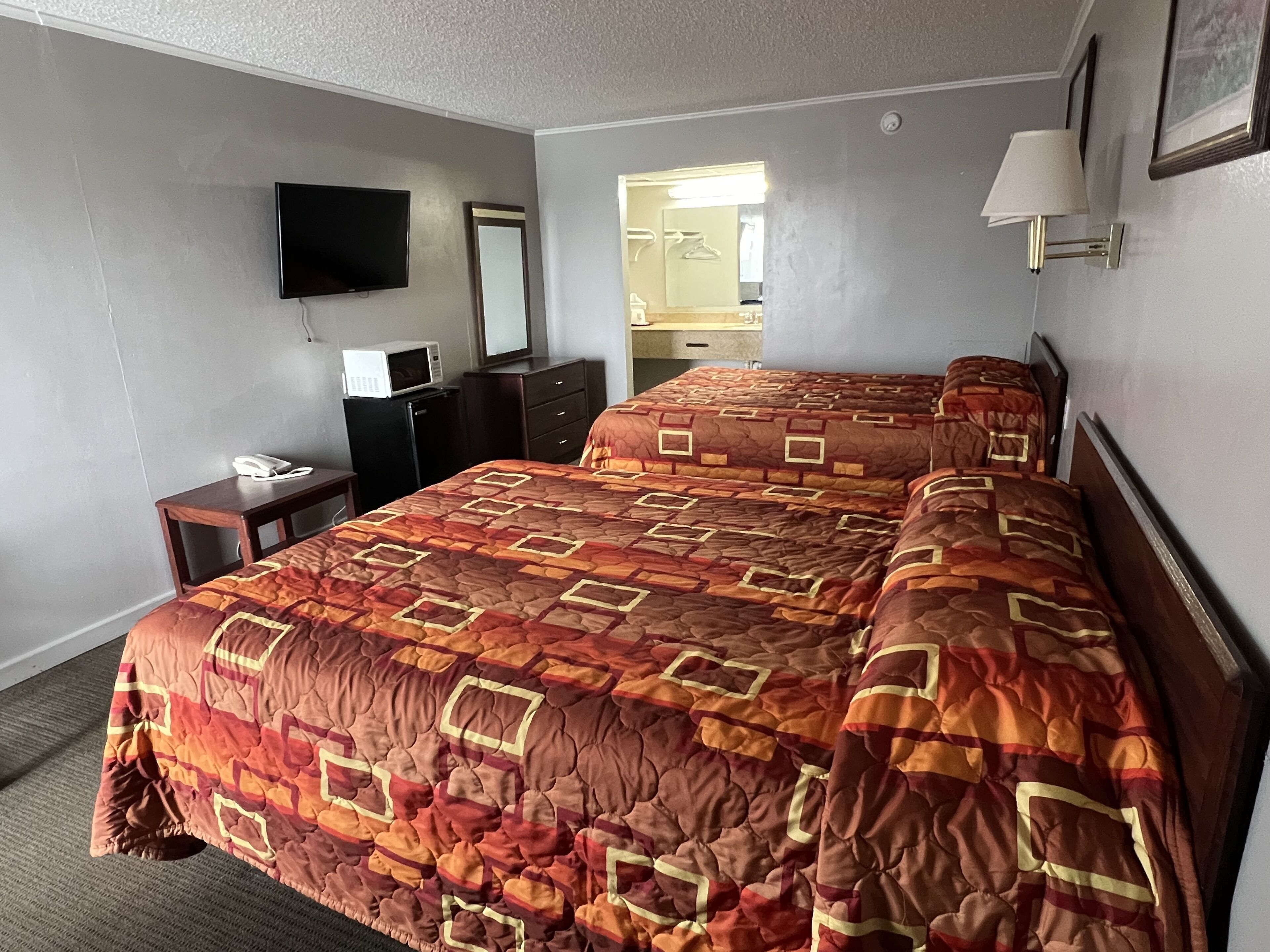 Standard Single Room, 2 Queen Beds, Smoking | WiFi (free), bed sheets
