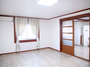 VIP Room | Living area | 30-inch flat-screen TV with cable channels, heated floors - Sorak Y Hostel (Sokcho)