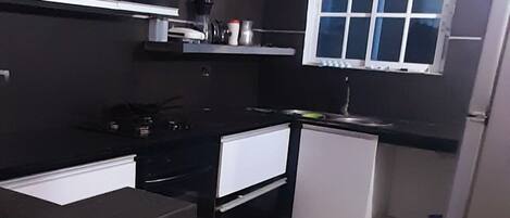 Fridge, oven, coffee/tea maker, toaster