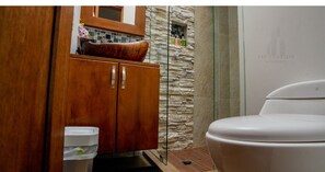 Shower, towels, soap, toilet paper