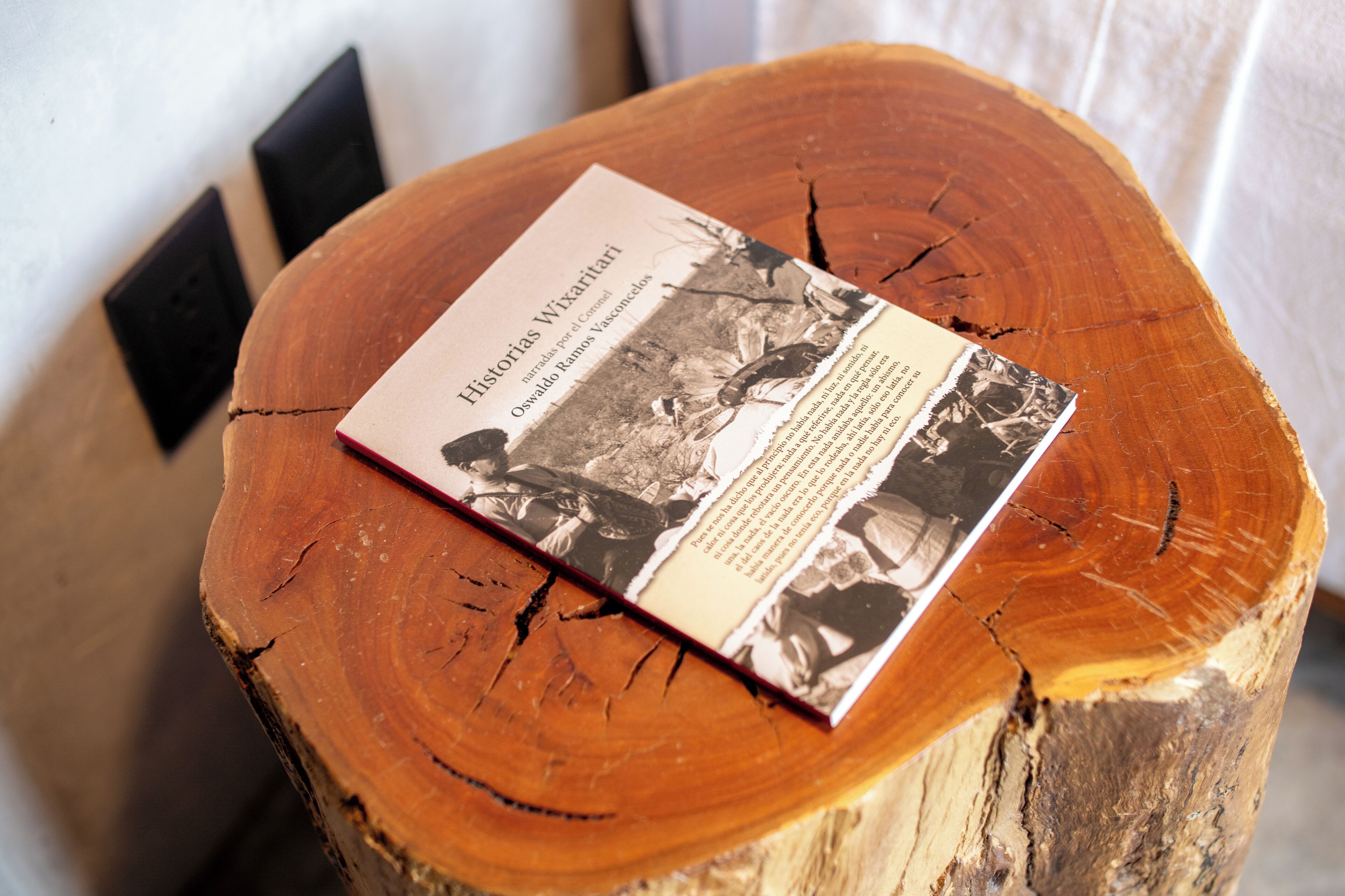 A wooden table with a placard on it.