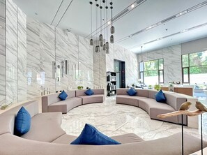 Premium Condo | Living area | 32-inch Smart TV with digital channels