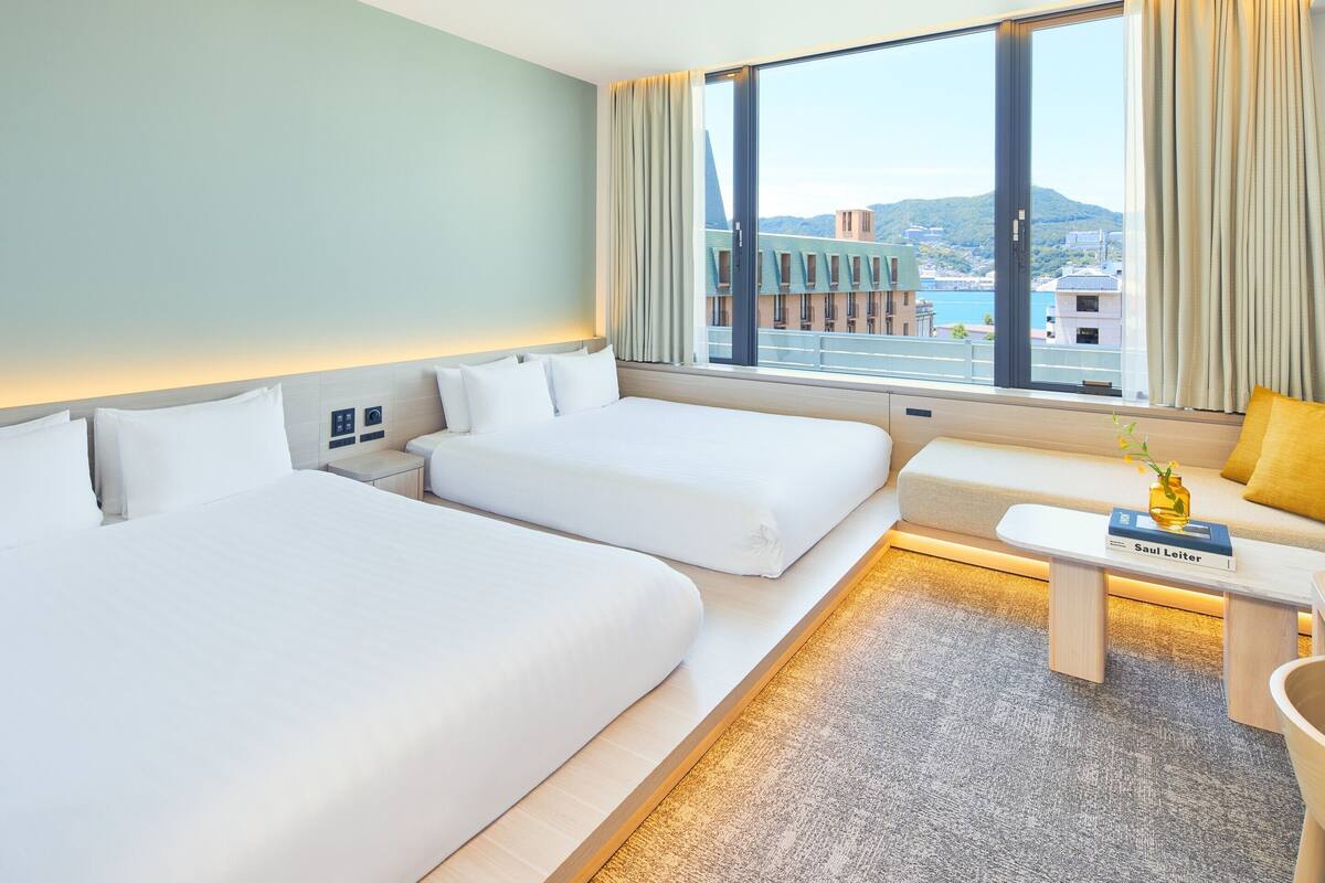 Kamar Twin Standar | Brankas, tirai kedap cahaya, Wi-Fi gratis, dan seprai linen