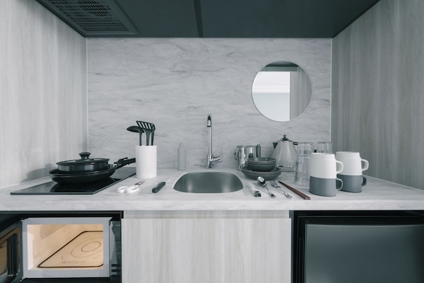 Mini-fridge, microwave, stovetop, electric kettle