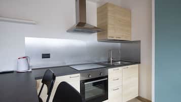 Habitación triple familiar, 1 habitación | Cocina privada