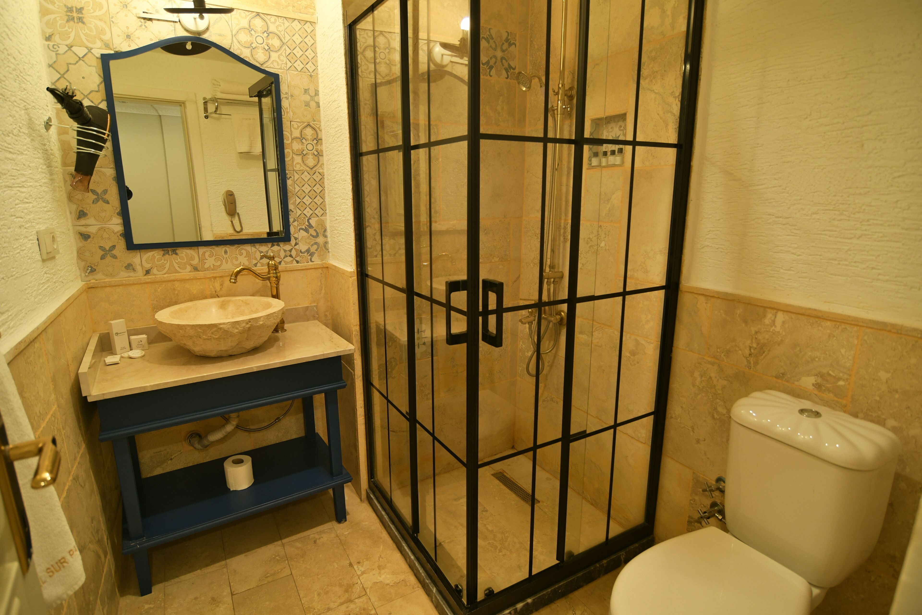 deluxe room | bathroom | shower, free toiletries, hair dryer, slippers