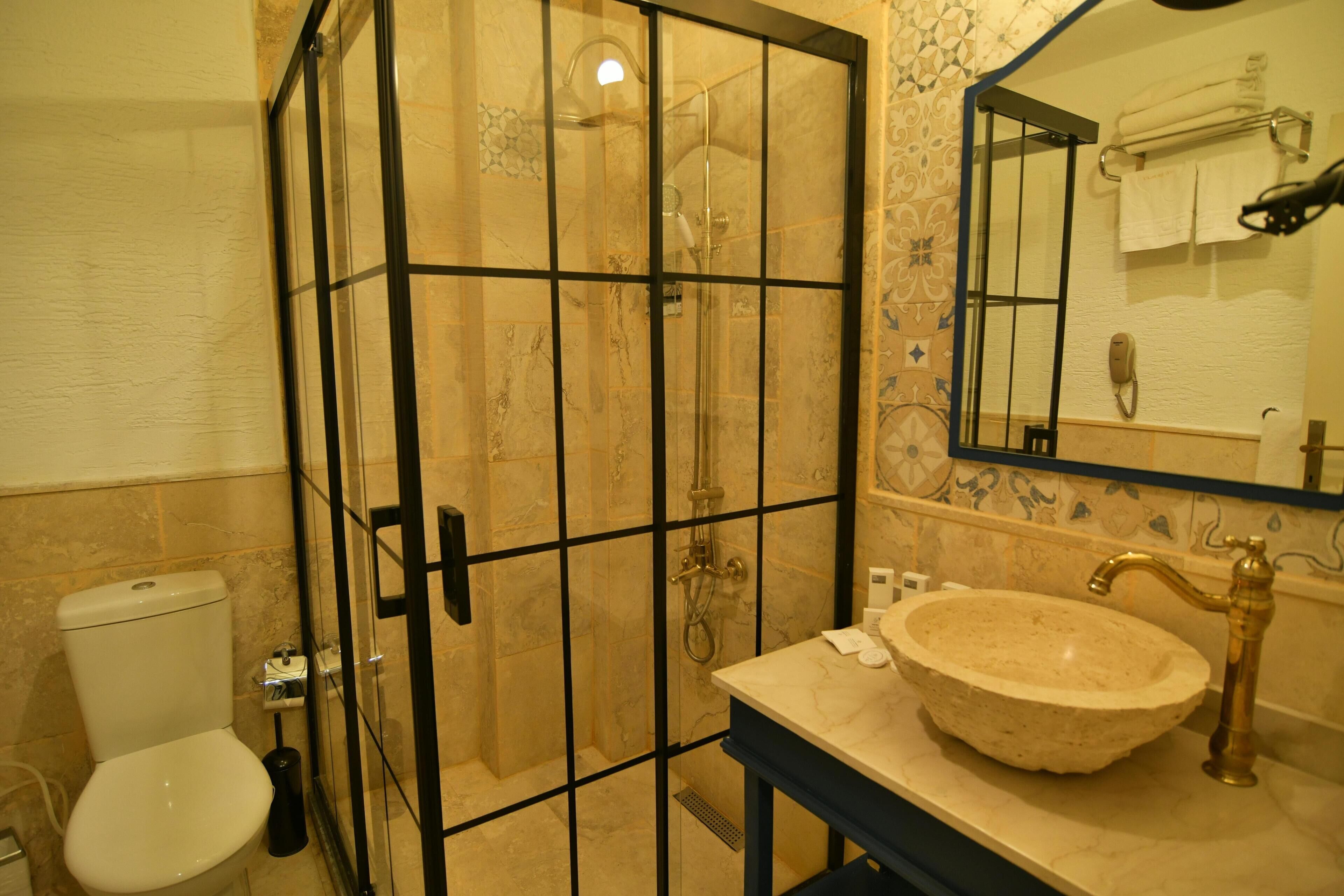 family room | bathroom | shower, free toiletries, hair dryer, slippers