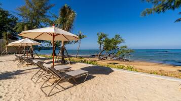 On the beach, white sand